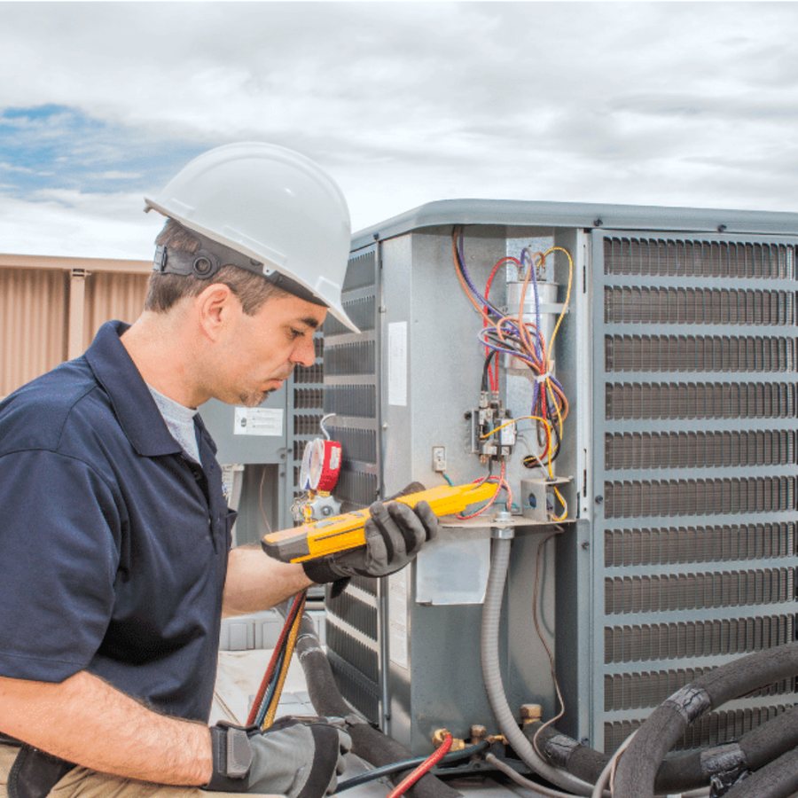 Aurora HVAC Pros HVAC technician servicing a system